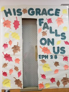 a bulletin board with the words his grace falls on us