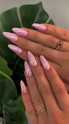 Discover beautiful chrome nails! Check out trendy designs, stylish colors, and elegant inspiration for your next manicure. Summer Nails Iridescent, Simple Statement Nails, Summer Cat Eye Nails 2023, Nails Irredescent, Pearly Purple Nails, Pink Irredescent Nails, Unique Almond Nails, Irridecent Design Nails, Fancy Almond Nails