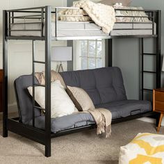 a bunk bed with futon underneath it in a living room next to a couch