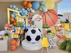 a sports themed birthday party with balloons and decorations