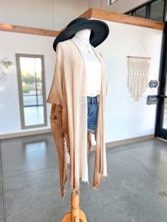 For those days when we wish we could layer on cardigans and dusters, but the weather tells you no. A perfect light layer to pretend it's Fall! A lightweight kimono with MAJOR boho vibes! The deets!: One Size Ombre knit Specs taken from size One Size: Length: 45" Materials: 100% Cotton Oversized Bohemian Fall Cover-up, Casual Wrap Cardigan For Beach Cover-up, Lightweight Open Front Outerwear For Fall, Spring Beach Cardigan With Fringe, Bohemian Spring Outerwear With Fringe, Bohemian Long Sleeve Fringe Cover-up, Casual Fall Cover-up For Layering, Brown Fall Beach Outerwear, Fall Brown Beach Outerwear