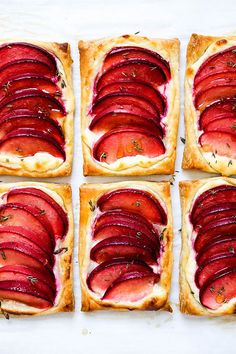 four slices of bread topped with sliced beets