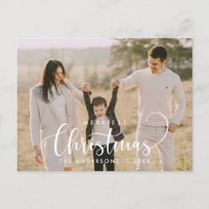 the merry christmas card features an image of a family holding hands