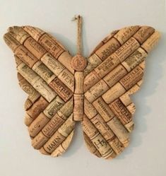 a butterfly made out of wine corks