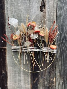 Gold metal hoop with dried flowers. greenery and textures. Excellent gift or home decor item for yourself! All items were grown and dried by us in Medford Oregon. The hoop itself is 10" in diameter. Hanging Flower Wall, Flower Wall, Home Decor Items, Oregon, Dried Flowers, Halloween Shopping, Decorative Items, Home And Living, Wall Hanging