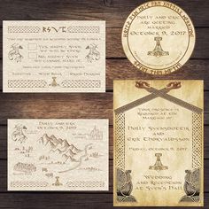 the wedding stationery is laid out on a wooden table