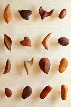 several different types of wooden spoons on a table