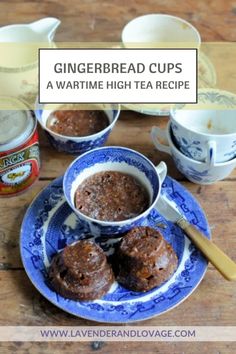 gingerbread cups in blue and white dishes on a wooden table with coffee mugs