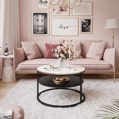 a living room filled with furniture and pictures on the wall above it's coffee table