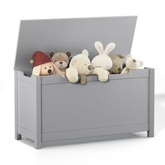 a toy chest with stuffed animals in it