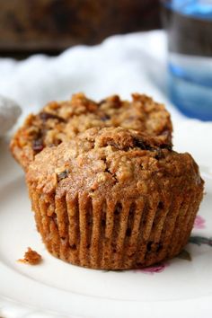 a muffin sitting on top of a white plate