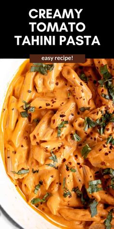 creamy tomato pasta in a white bowl with parsley on top and text overlay