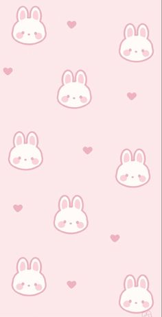 a pink wallpaper with bunny ears and hearts