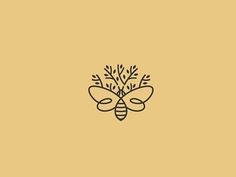 a bee with leaves on it's back and the word honey written in black