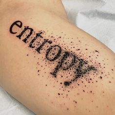 a close up of a person's arm with black ink that reads ent on it