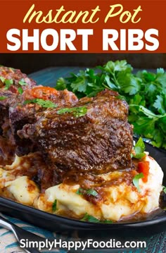 instant pot short ribs with potatoes and parsley on the side in a black plate