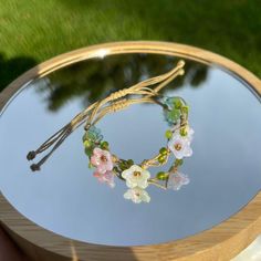 This is an adjustable string bracelet with flowers charm. exactly like these pictures. feel free to ask me for any questions. thank you <3 Adjustable String Bracelet, Floral Jewelry, Jewelry Bridesmaid, String Bracelet, Floral Jewellery, Flower Bracelet, Bridesmaid Gift, Nature Inspired, Bridesmaid Gifts