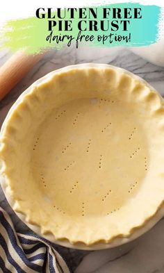 an uncooked pie crust on a marble counter top