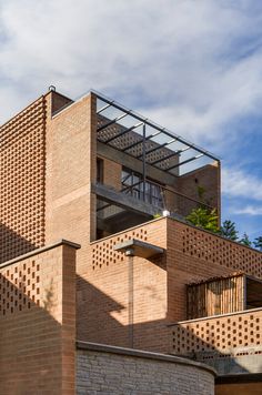 a building made out of bricks with a sky background