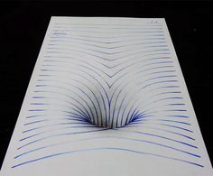 a piece of paper with blue lines on it and an upside down spiral in the middle