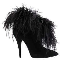 Saint Laurent Zizi 110 Black Suede High Stiletto Heel Ankle Boot Saint Laurent's FW19 runway show saw legs take center stage, with models wearing tiny shorts and mini skirts – the perfect choice to show off this season's statement footwear. Crafted from black suede, leather and feathers, these Zizi 110mm booties feature a pointed toe and a high stiletto heel. Brand new. Made in Italy. Size: 39 (FR) Fit: Saint Laurent shoes usually run small. Please order a 1/2 size larger than you typically wear Fringed Boots, Saint Laurent Boots, Tiny Shorts, Attractive Clothing, Womens Black Booties, Yves Saint Laurent Shoes, Couture Mode, Saint Laurent Shoes, Anna Sui