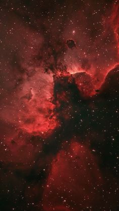 an image of the sky with stars and clouds in it, as seen from space