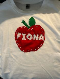 a t - shirt with the word fona painted on it