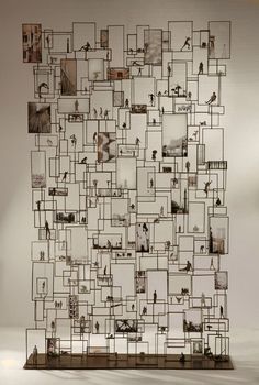 a sculpture made out of multiple frames with people on them