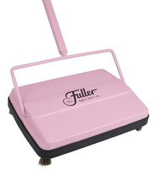 a pink floor sweeper sitting on top of a white surface next to a black handle