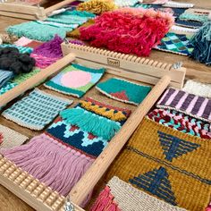 several pieces of weaving are laid out on the floor