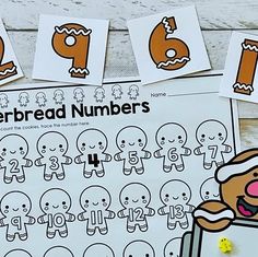 the gingerbread numbers are arranged on top of each other, with paper cut outs