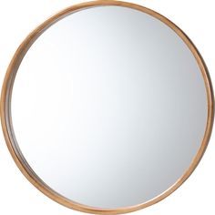 a round wooden mirror on a white background