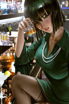 a woman in a green dress sitting at a bar