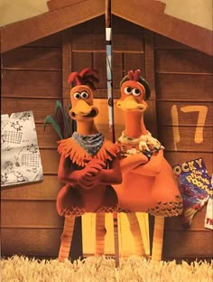 an image of two chickens that are standing in front of a barn with music notes on it