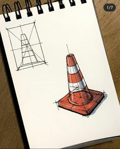 a drawing of a traffic cone sitting on top of a wooden table