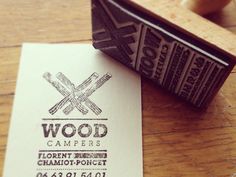 a rubber stamp with the words wood campers on it next to a piece of paper