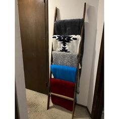 a towel rack in the corner of a room