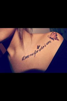 a woman with a tattoo on her shoulder saying love me for who i am