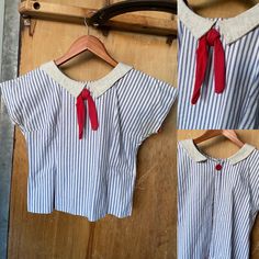 "Vintage 1930s cotton pinstripe top, beach pajama style. Sailor collar and bright red bow, one single button at the back for an open back look. The fabric is a heavy cotton, and the sleeve and hem are finished with seam tape.  Condition: excellent vintage condition. slight yellowing at armpits. Labels/tags: none Measurements: taken flat -bust from pit to pit 19\". best for a 32\" or smaller, bust is high. -sleeve length from center neck to hem 11.5\" -waist from seam to seam 15.75\" -overall length 19.5\" *To ensure a great fit, we recommend comparing the measurements above to a similar garment you own and love to wear, as sizing varies across the decades.  *If ordering more than one item, I will adjust shipping costs and refund the difference as shipping has been added into my pricing.  * Sailor Outfit For Women, Cottagecore Fits, Pinstripe Top, Homemade Clothes, Pajama Style, Reindeer Sweater, Kilt Skirt, Sailor Fashion, Sailor Collar