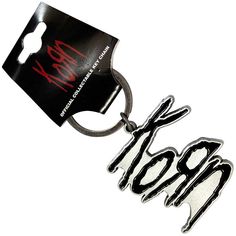 a keychain with the word boo on it's front and back sides