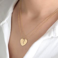 Celebrate your bond with this beautiful personalized broken heart necklace set, available in gold or silver. Each side of the heart can be engraved with initials or names, making it a perfect gift for couples, best friends, or family. The minimalist design is ideal for both everyday wear and special occasions, offering a meaningful way to stay connected to your loved ones. Materials: Available in solid gold, gold-plated, or sterling silver. Customization: Personalize each half of the heart with Heart-shaped Gold Custom Necklace For Personalized Gift, Heart-shaped Engraved Name Necklace For Gift, Customizable Heart-shaped Necklace For Best Friend Gift, Personalized Necklace For Anniversary, Valentine's Day Gift, Customizable Heart-shaped Valentine's Day Necklace, Stay Connected, Necklace Dainty, Matching Necklaces, Dainty Jewelry