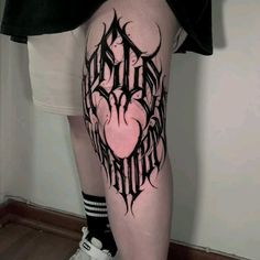 a person with a tattoo on their leg