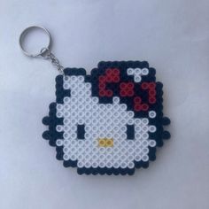 a hello kitty keychain made out of legos