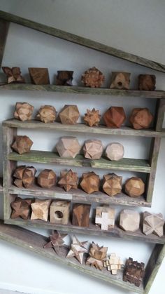 several wooden shelves with different shapes and sizes