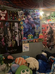 a room filled with lots of stuffed animals and posters on the wall above it's head