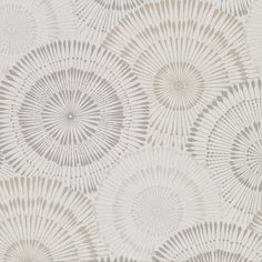 a white and grey wallpaper with circular designs