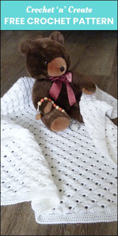 a brown teddy bear sitting on top of a white crocheted blanket with the words crochet in create free crochet pattern