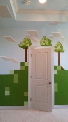 a room with a door and some trees painted on the wall behind it is a carpeted floor