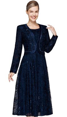 Introducing the Nina Nischelle 3637-NVY Jacket Dress - a statement piece that exudes sophistication and style. Crafted with meticulous attention to detail, the navy color provides a rich, deep backdrop that is versatile for any special occasion. This ensemble aims to offer a blend of comfort, style, and versatility. The dress features intricate lace detailing that adds a touch of grace and femininity to the design. The three-quarter sleeves are both functional and stylish, providing modest coverage while remaining elegant. The knee-length inner dress is designed for comfort without compromising on style, ensuring you can move with ease during any event. Included with this beautiful dress is a matching jacket that completes the look. The jacket not only adds an extra layer for those cooler Navy Dress For Fall Party, Elegant Fitted Outerwear For Gala, Elegant Navy Dress For Fall, Elegant Blue Party Outerwear, Elegant Navy Dresses For Fall, Long Sleeve Jacket Dress For Evening, Elegant Evening Jacket Dress For Fall, Long Sleeve Jacket Dress For Fall Wedding, Elegant Fall Evening Jacket Dress