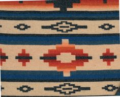 an old navajo rug with geometric designs on it's edges and fringes in red, blue, and white